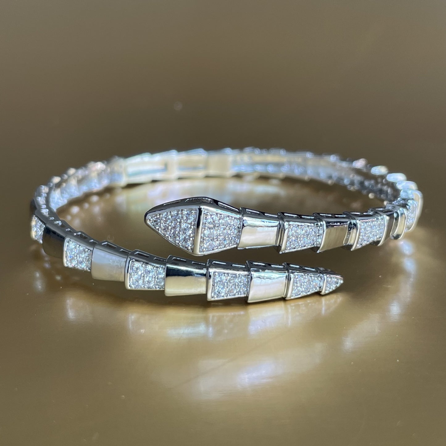 “Elegant White Gold Interlaced Bracelet – Silver Plated, Open Style” Add to a Collection (optional but good for store)